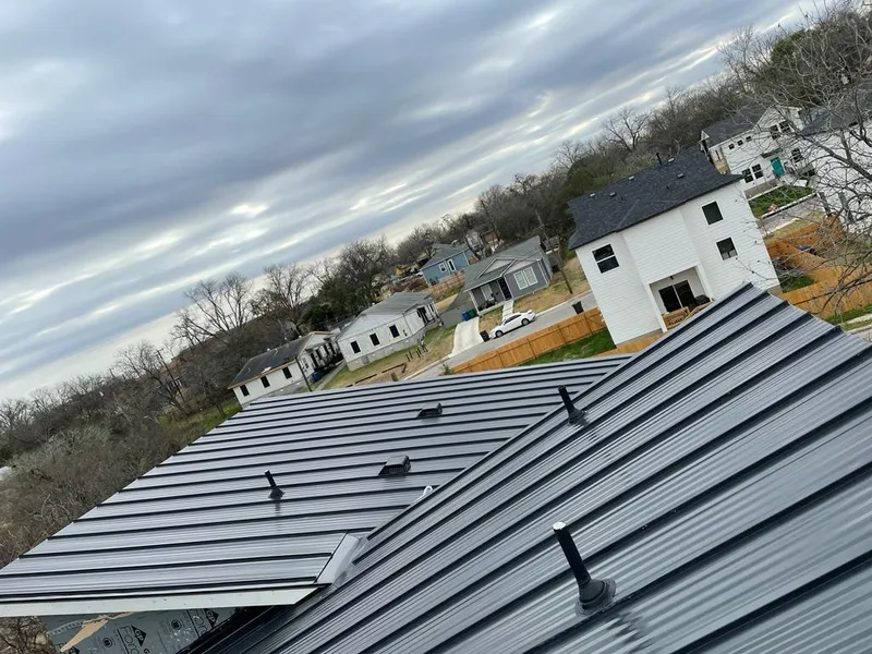 Standing seam metal roof panels with vents for Skylight Repair in Berea